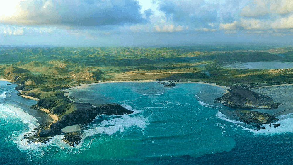 Tanjung Aan Beach Lombok scenic bay view with turquoise sea water and white sand beach